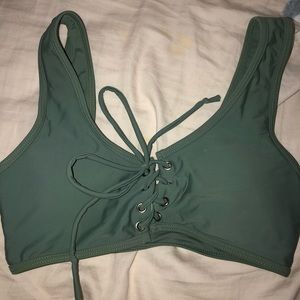 Green swimsuit top